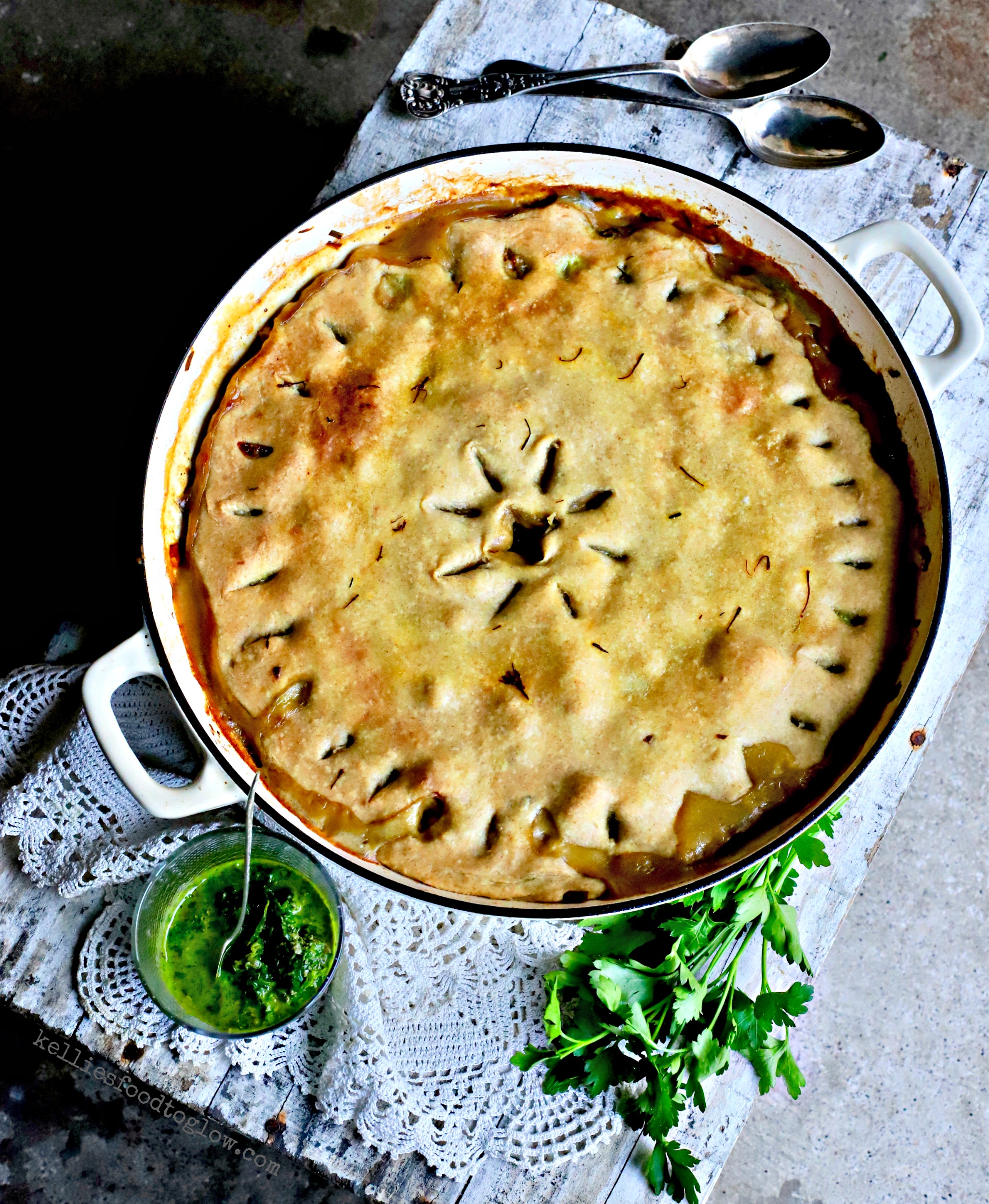 Vegetable pot pie gone a bit fancy with saffron, porcini mushrooms and an olive oil crust. This #vegan, weekend family #food #recipe will remind you of pot pies of yore, but without the saturated fat. #potpie #familyrecipe #vegetables #vegetarian #baking